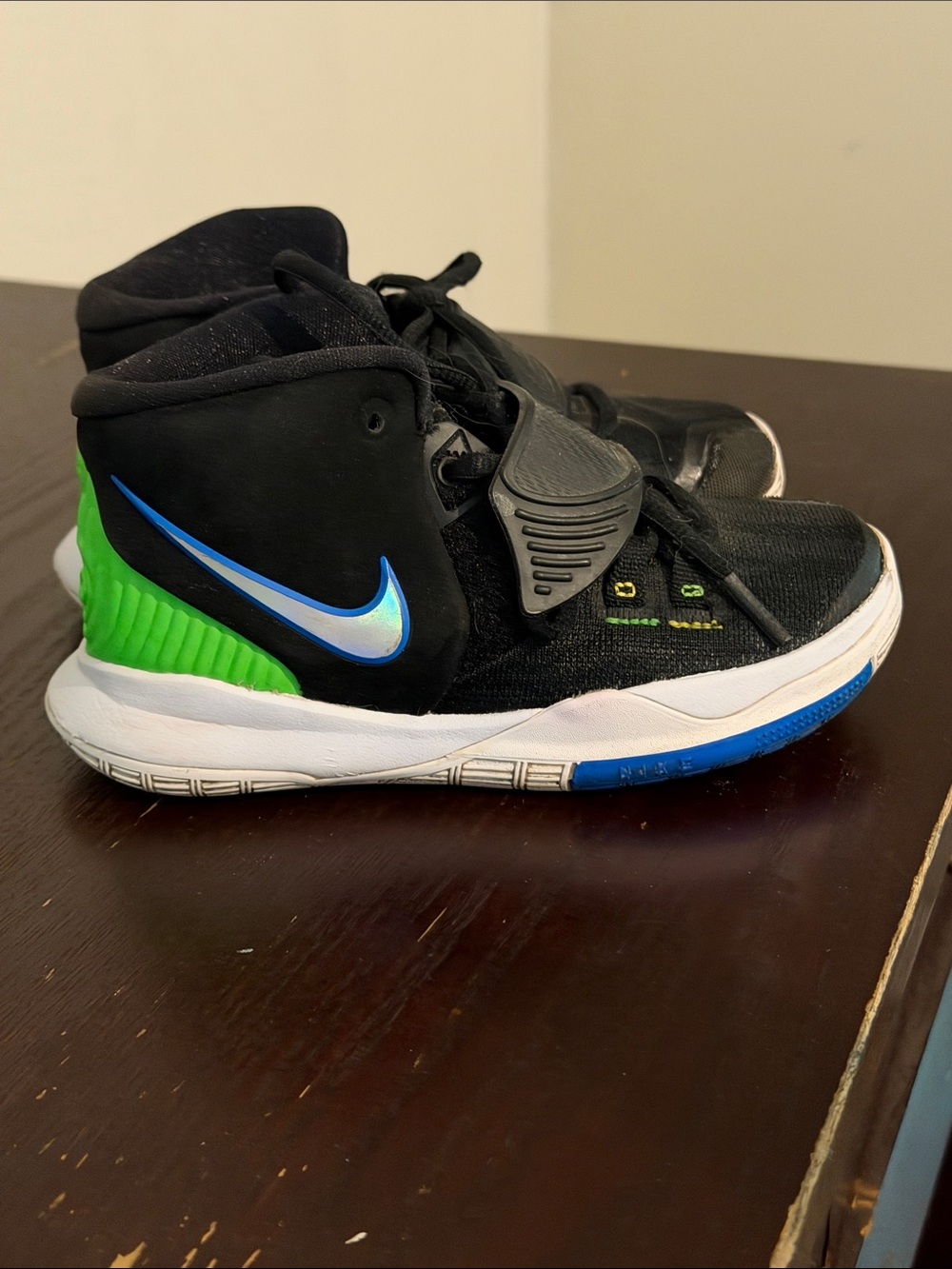 Nike Kids Kyrie Black High-Top Sneakers with Holographic Swoosh and Neon Heel